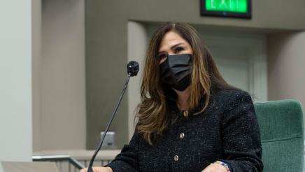 Closeup of Assemblymember Lisa Calderon with a mask on introducing the AB742 - School Supplies for Homeless Children Voluntary Tax Contribution Fund Bill